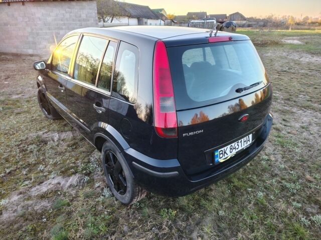 Синій Форд Фьюжен, об'ємом двигуна 1.4 л та пробігом 255 тис. км за 4200 $, фото 2 на Automoto.ua