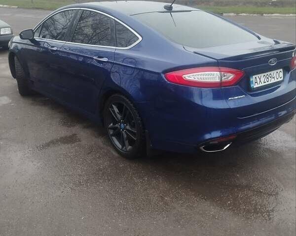 Синій Форд Фьюжен, об'ємом двигуна 2 л та пробігом 244 тис. км за 9000 $, фото 4 на Automoto.ua