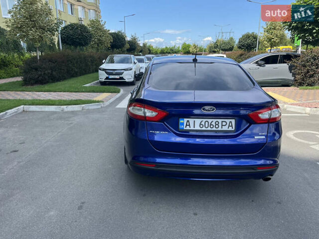 Синий Форд Фьюжн, объемом двигателя 1.6 л и пробегом 215 тыс. км за 9100 $, фото 5 на Automoto.ua