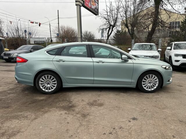 Синий Форд Фьюжн, объемом двигателя 2 л и пробегом 177 тыс. км за 12540 $, фото 4 на Automoto.ua