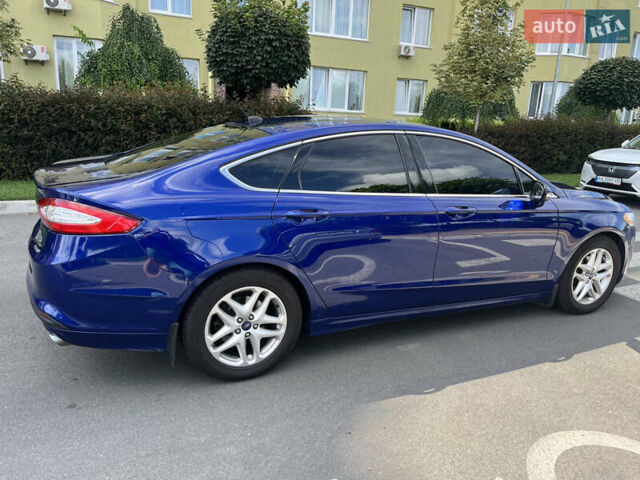 Синий Форд Фьюжн, объемом двигателя 1.6 л и пробегом 215 тыс. км за 9100 $, фото 4 на Automoto.ua