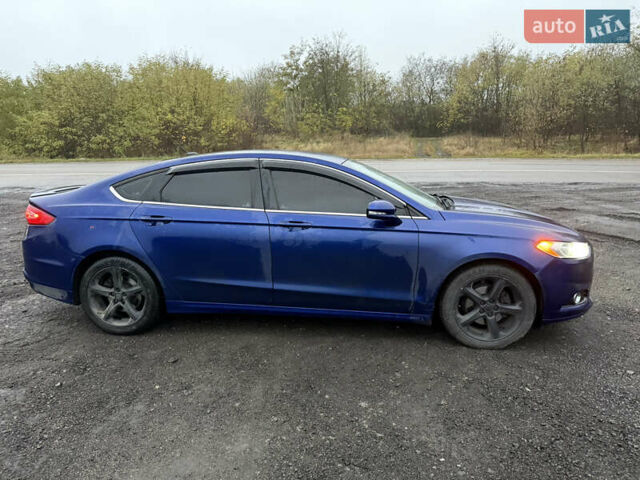 Синій Форд Фьюжен, об'ємом двигуна 2 л та пробігом 265 тис. км за 9300 $, фото 14 на Automoto.ua