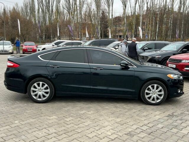 Синий Форд Фьюжн, объемом двигателя 2 л и пробегом 212 тыс. км за 9800 $, фото 7 на Automoto.ua