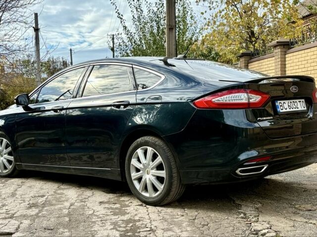 Синий Форд Фьюжн, объемом двигателя 2 л и пробегом 212 тыс. км за 9850 $, фото 5 на Automoto.ua