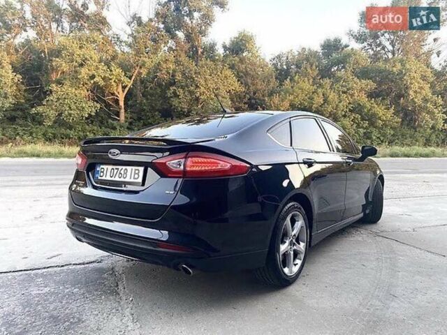 Синій Форд Фьюжен, об'ємом двигуна 2.5 л та пробігом 176 тис. км за 9450 $, фото 4 на Automoto.ua