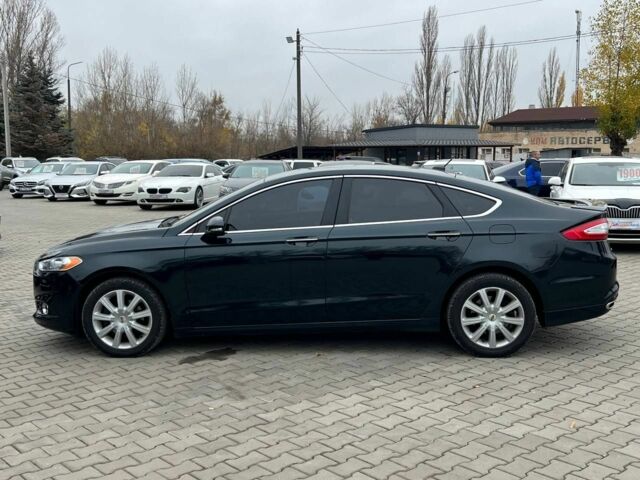 Синий Форд Фьюжн, объемом двигателя 2 л и пробегом 212 тыс. км за 9800 $, фото 3 на Automoto.ua