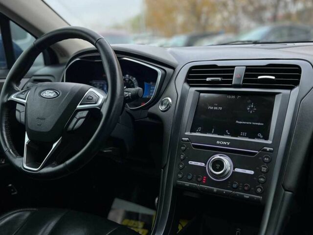 Синій Форд Фьюжен, об'ємом двигуна 2 л та пробігом 185 тис. км за 275 $, фото 17 на Automoto.ua