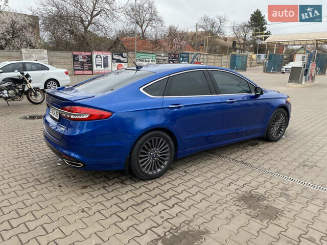 Синій Форд Фьюжен, об'ємом двигуна 2 л та пробігом 226 тис. км за 12750 $, фото 25 на Automoto.ua