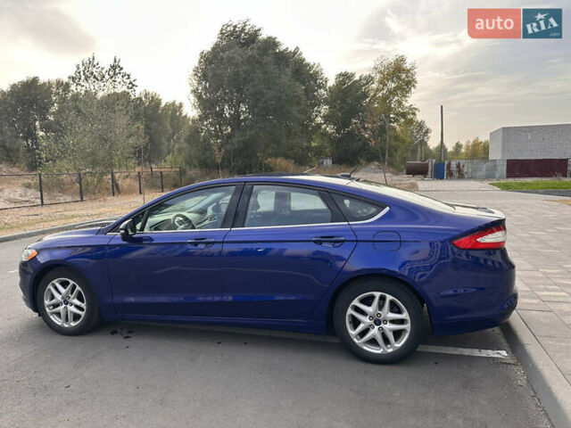 Синій Форд Фьюжен, об'ємом двигуна 2.4 л та пробігом 49 тис. км за 11300 $, фото 4 на Automoto.ua