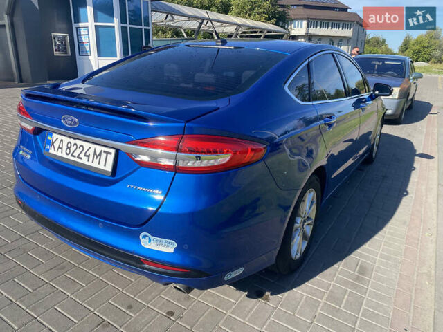 Синій Форд Фьюжен, об'ємом двигуна 2 л та пробігом 148 тис. км за 11999 $, фото 4 на Automoto.ua