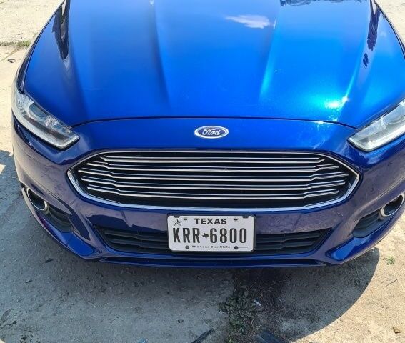 Синій Форд Фьюжен, об'ємом двигуна 2 л та пробігом 203 тис. км за 10500 $, фото 4 на Automoto.ua