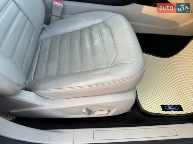 Синий Форд Фьюжн, объемом двигателя 2 л и пробегом 227 тыс. км за 12800 $, фото 51 на Automoto.ua