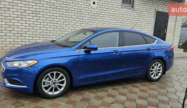 Синій Форд Фьюжен, об'ємом двигуна 2.5 л та пробігом 135 тис. км за 10800 $, фото 2 на Automoto.ua