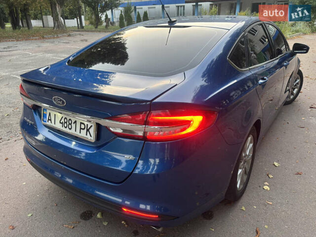 Синій Форд Фьюжен, об'ємом двигуна 2.49 л та пробігом 143 тис. км за 11100 $, фото 4 на Automoto.ua