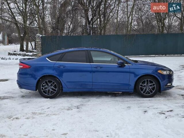 Синій Форд Фьюжен, об'ємом двигуна 2.49 л та пробігом 83 тис. км за 15000 $, фото 4 на Automoto.ua