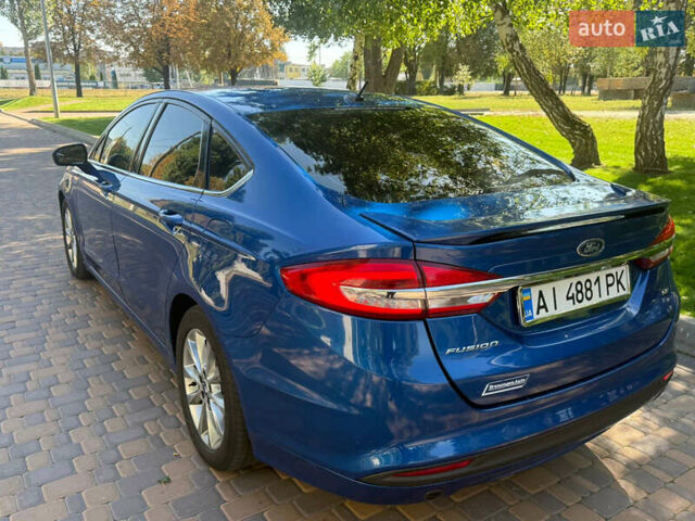 Синій Форд Фьюжен, об'ємом двигуна 2.49 л та пробігом 141 тис. км за 11500 $, фото 4 на Automoto.ua