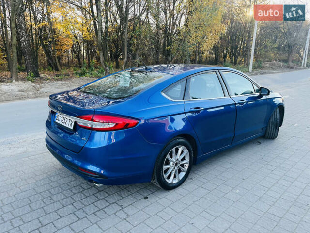 Синій Форд Фьюжен, об'ємом двигуна 2.49 л та пробігом 189 тис. км за 9400 $, фото 2 на Automoto.ua