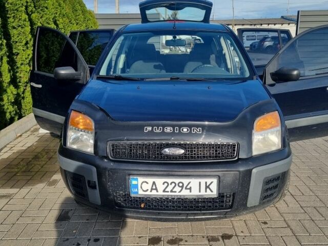 Синий Форд Фьюжн, объемом двигателя 1.2 л и пробегом 283 тыс. км за 3500 $, фото 10 на Automoto.ua