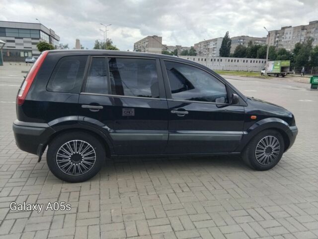 Синий Форд Фьюжн, объемом двигателя 1.2 л и пробегом 283 тыс. км за 3500 $, фото 2 на Automoto.ua