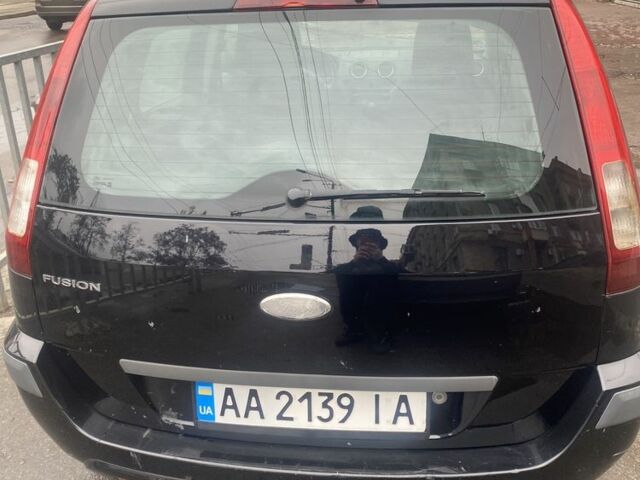 Синій Форд Фьюжен, об'ємом двигуна 1.4 л та пробігом 200 тис. км за 4350 $, фото 4 на Automoto.ua