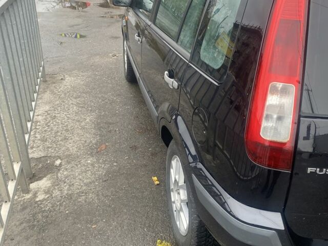 Синій Форд Фьюжен, об'ємом двигуна 1.4 л та пробігом 200 тис. км за 4350 $, фото 5 на Automoto.ua