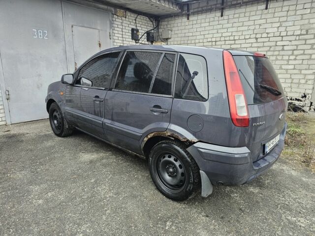 Синій Форд Фьюжен, об'ємом двигуна 1.4 л та пробігом 445 тис. км за 2300 $, фото 4 на Automoto.ua