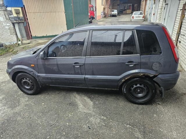 Синій Форд Фьюжен, об'ємом двигуна 1.4 л та пробігом 445 тис. км за 2300 $, фото 5 на Automoto.ua