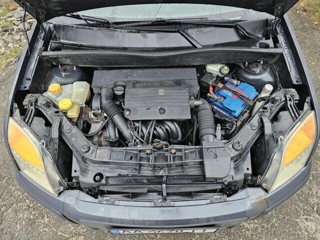 Синій Форд Фьюжен, об'ємом двигуна 1.4 л та пробігом 445 тис. км за 2300 $, фото 10 на Automoto.ua