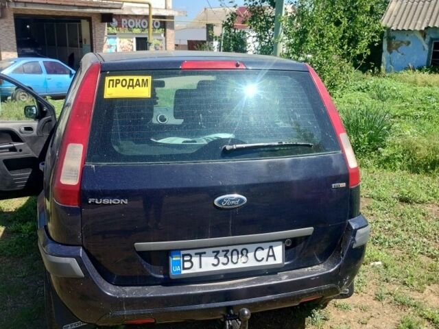 Синий Форд Фьюжн, объемом двигателя 1.4 л и пробегом 200 тыс. км за 3500 $, фото 1 на Automoto.ua