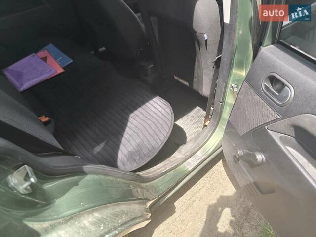 Зеленый Форд Фьюжн, объемом двигателя 1.25 л и пробегом 169 тыс. км за 5100 $, фото 13 на Automoto.ua