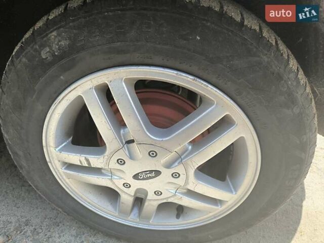 Зеленый Форд Фьюжн, объемом двигателя 1.25 л и пробегом 169 тыс. км за 5100 $, фото 4 на Automoto.ua