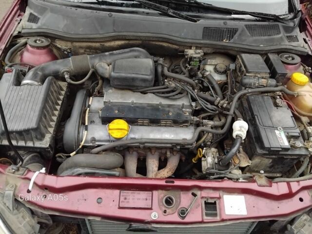 Красный Форд ГТ, объемом двигателя 1.6 л и пробегом 318 тыс. км за 2450 $, фото 2 на Automoto.ua