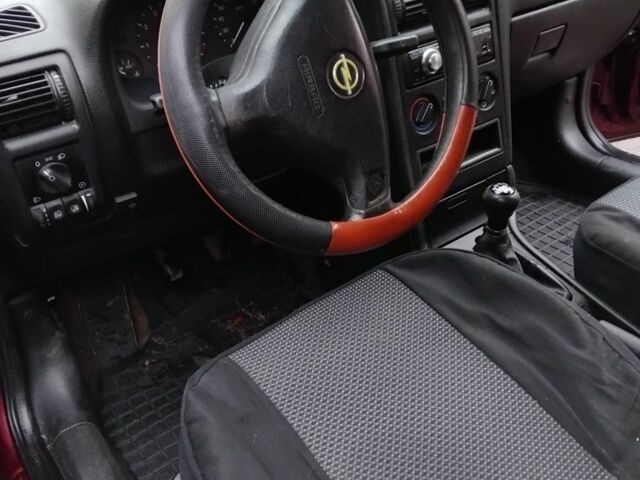 Красный Форд ГТ, объемом двигателя 1.6 л и пробегом 318 тыс. км за 2450 $, фото 5 на Automoto.ua