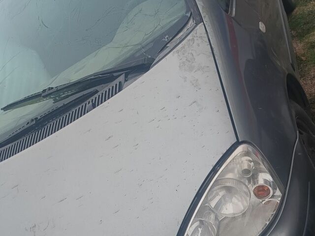 Серый Форд Галакси, объемом двигателя 2 л и пробегом 406 тыс. км за 712 $, фото 1 на Automoto.ua