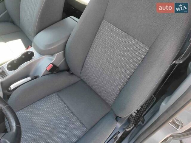 Серый Форд Гранд С-макс, объемом двигателя 1.6 л и пробегом 185 тыс. км за 7000 $, фото 12 на Automoto.ua