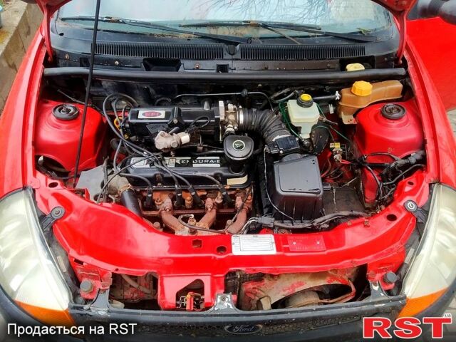 Червоний Форд КА, об'ємом двигуна 1.3 л та пробігом 100 тис. км за 1499 $, фото 8 на Automoto.ua