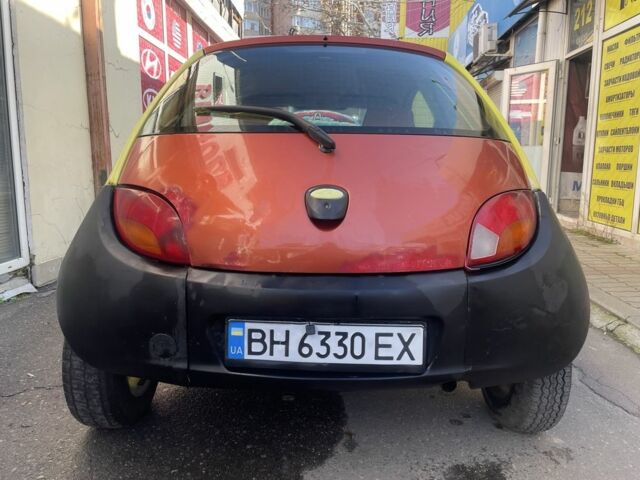 Желтый Форд КА, объемом двигателя 1.3 л и пробегом 180 тыс. км за 1100 $, фото 2 на Automoto.ua