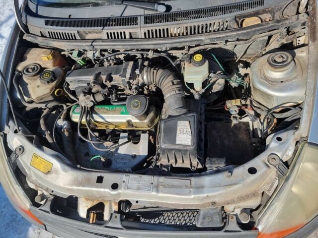 Сірий Форд КА, об'ємом двигуна 1.3 л та пробігом 260 тис. км за 900 $, фото 4 на Automoto.ua