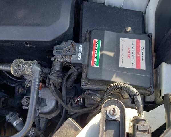 Белый Форд Куга, объемом двигателя 2.52 л и пробегом 225 тыс. км за 10700 $, фото 2 на Automoto.ua