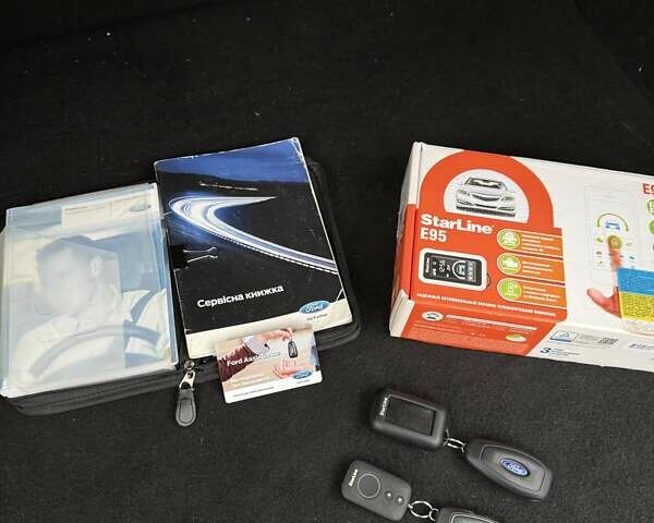 Белый Форд Куга, объемом двигателя 2 л и пробегом 272 тыс. км за 11499 $, фото 22 на Automoto.ua