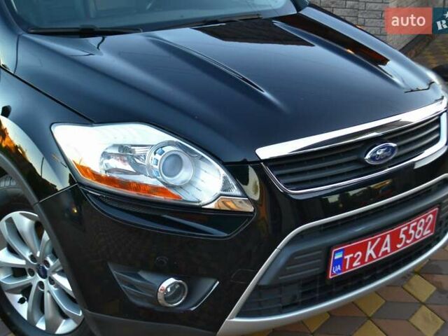 Черный Форд Куга, объемом двигателя 2 л и пробегом 228 тыс. км за 10450 $, фото 5 на Automoto.ua