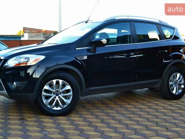 Черный Форд Куга, объемом двигателя 2 л и пробегом 228 тыс. км за 10450 $, фото 18 на Automoto.ua