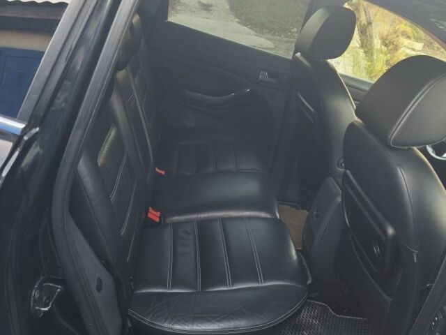 Черный Форд Куга, объемом двигателя 2.5 л и пробегом 210 тыс. км за 9800 $, фото 5 на Automoto.ua