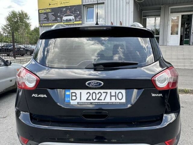 Черный Форд Куга, объемом двигателя 2 л и пробегом 220 тыс. км за 9600 $, фото 5 на Automoto.ua