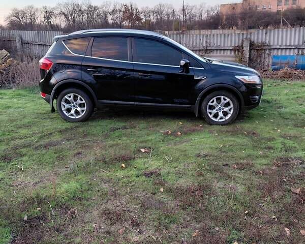 Чорний Форд Куга, об'ємом двигуна 2 л та пробігом 239 тис. км за 10600 $, фото 1 на Automoto.ua