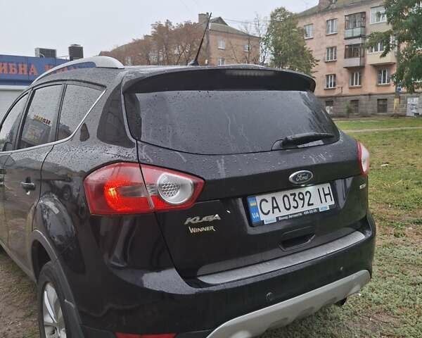 Черный Форд Куга, объемом двигателя 2 л и пробегом 185 тыс. км за 10700 $, фото 1 на Automoto.ua