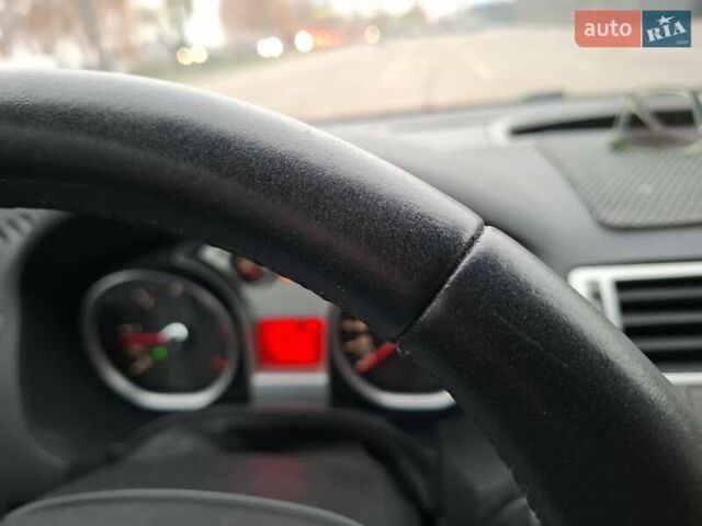 Чорний Форд Куга, об'ємом двигуна 2 л та пробігом 128 тис. км за 12999 $, фото 68 на Automoto.ua