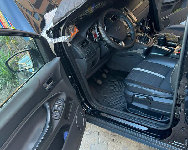 Черный Форд Куга, объемом двигателя 2 л и пробегом 220 тыс. км за 9700 $, фото 8 на Automoto.ua