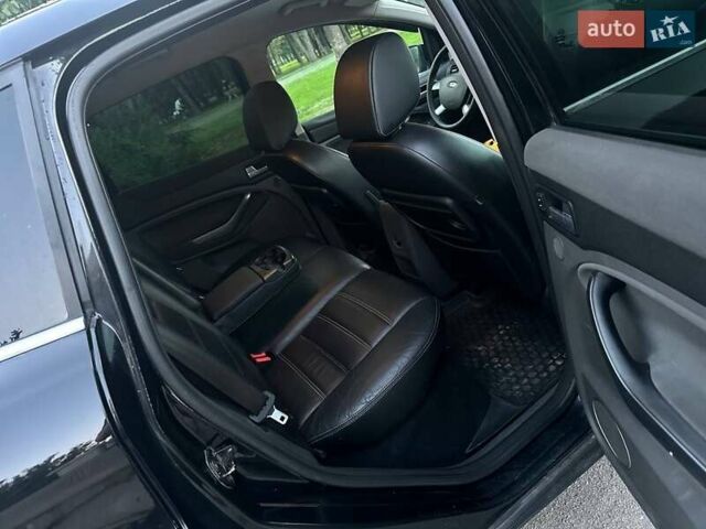 Черный Форд Куга, объемом двигателя 2 л и пробегом 215 тыс. км за 10450 $, фото 45 на Automoto.ua