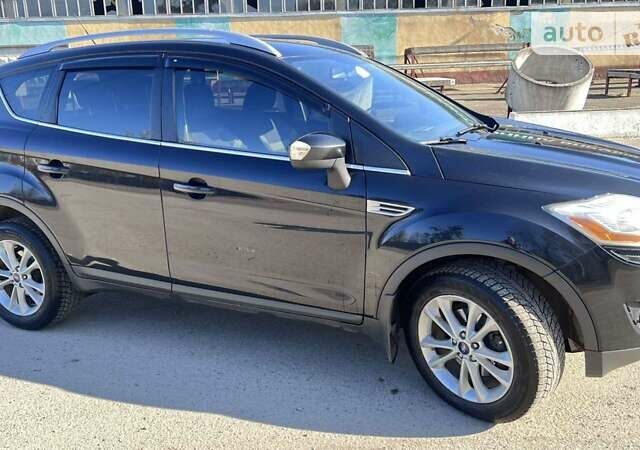 Черный Форд Куга, объемом двигателя 2.52 л и пробегом 220 тыс. км за 9750 $, фото 7 на Automoto.ua